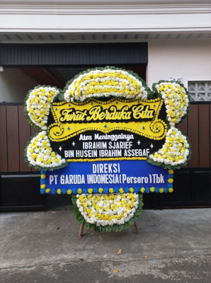 Papan Bunga Duka di Jamika